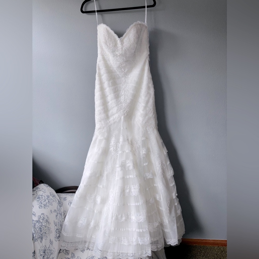 NWT designer wedding dress. Bought from “The White Dress” size 10 never altered - Picture 6 of 16